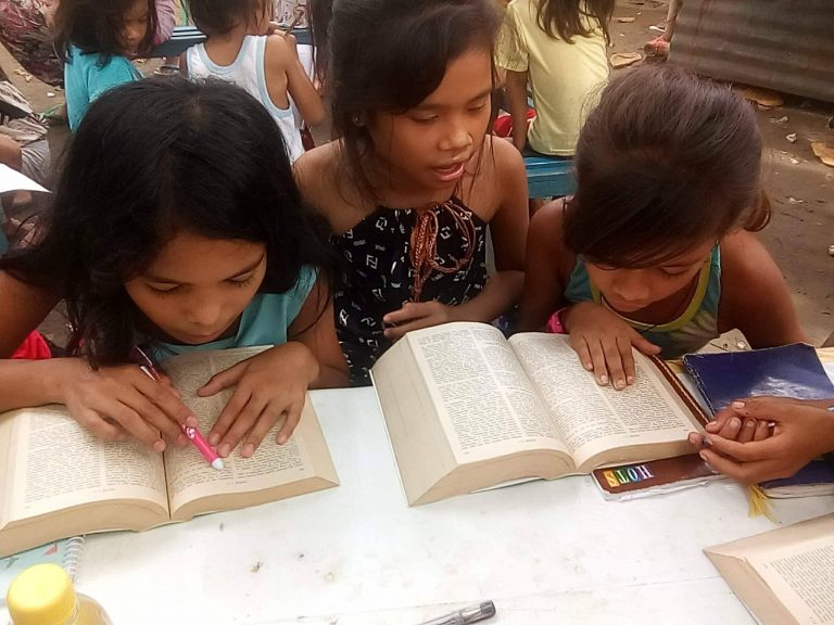Children learning the Bible